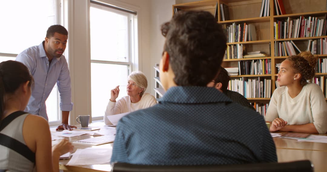 Businessman addressing team meeting
